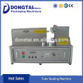 Continuous ultrasonic cosmetic tube sealing machine
